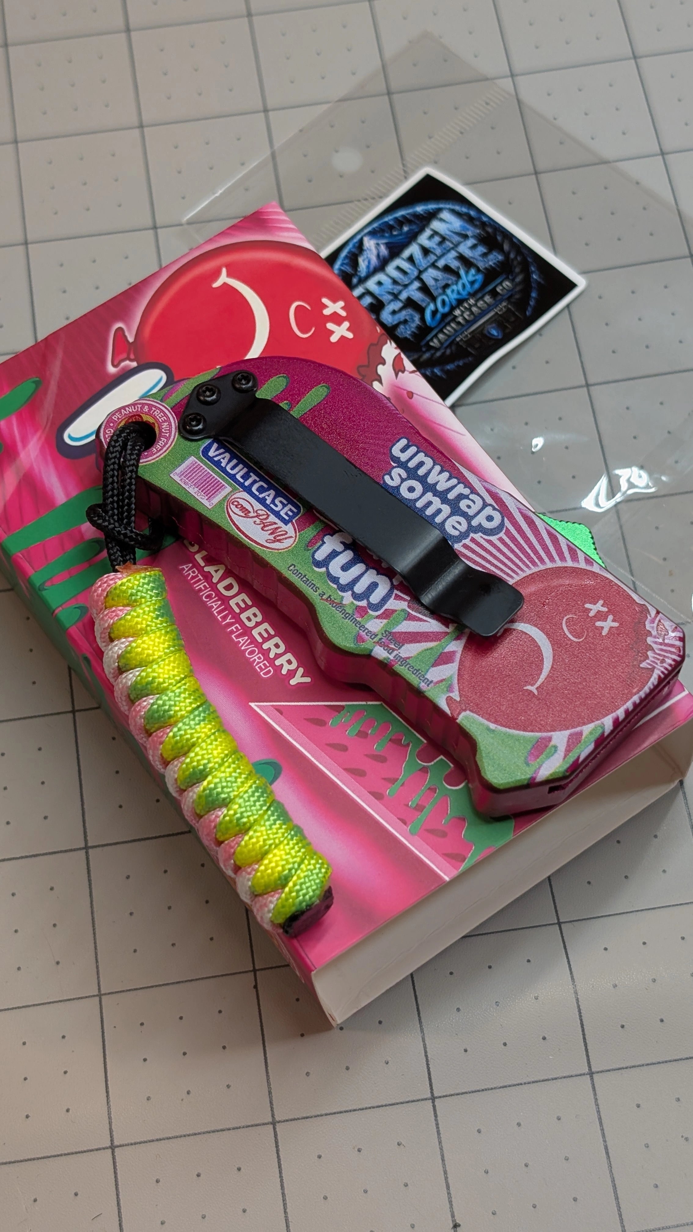 Frozen State Cords paracord lanyard, neon pink and yellow, Sour Patch Knife Utility Blade edition, back view