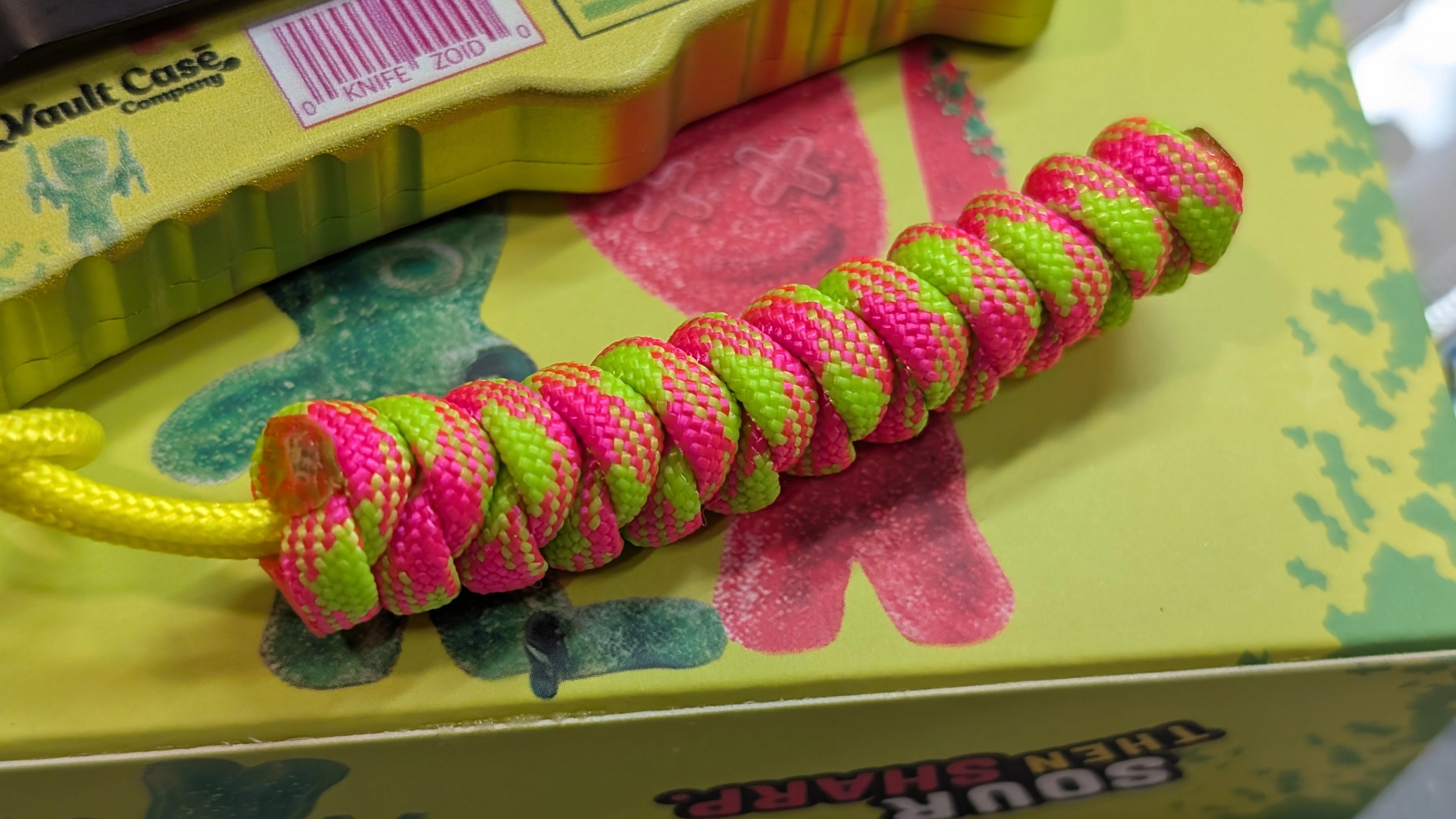 Frozen State Cords paracord lanyard, pink and green, Airheads Utility Blade edition, macro weave detail
